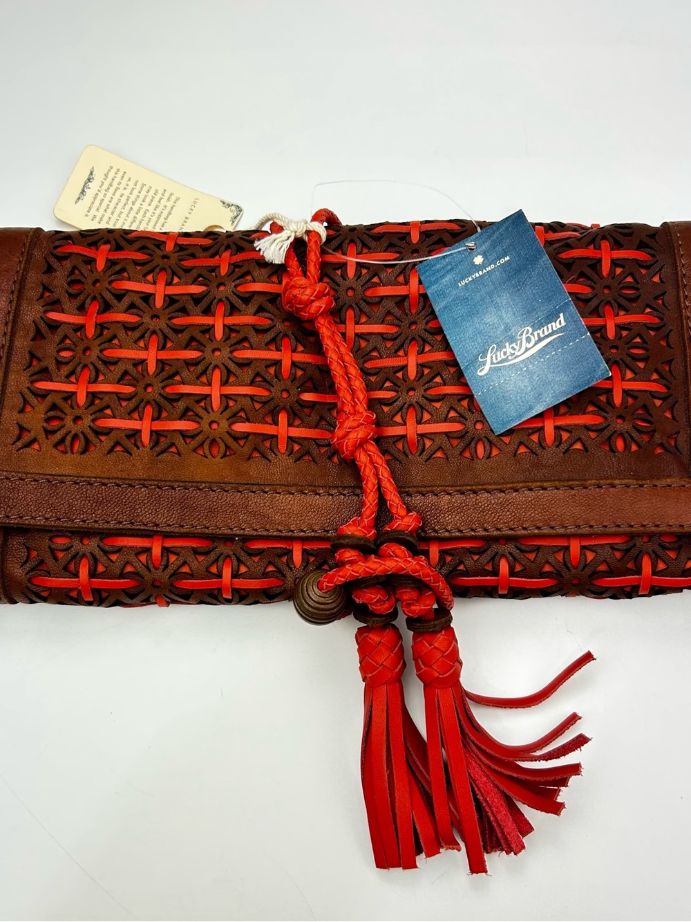 NWT Lucky Brand Brown & Red Leather Woven Clutch Tassel Lazer Cut
